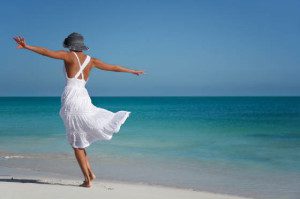 Woman-Dancing-On-Beach